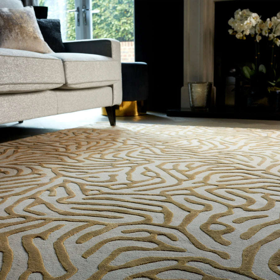 Gold coral rug in sitting room