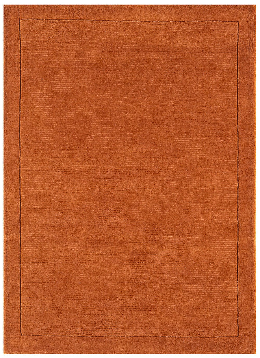 Discover the warmth of our plain terracotta rug, bringing earthy charm to any space. With its rich, burnt-orange hue reminiscent of sun-kissed clay, this rug adds a touch of rustic elegance to your décor.